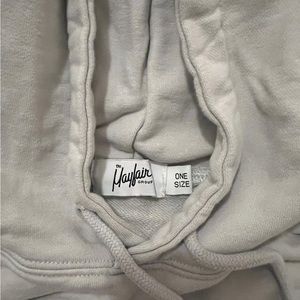 Mayfair “Out of our vulnerabilities, we find strength” hooded sweatshirt